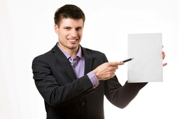 Smiling young business man,showing a white card.