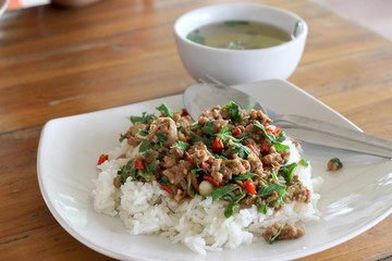 thai food. Fried basil leave with pork on rice
