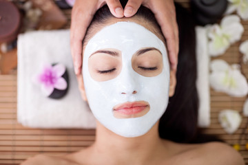 Adult woman having beauty treatments in the spa salon