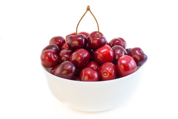 A bowl of cherries isolated