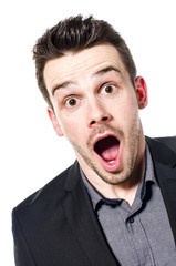 Portrait of amazed businessman