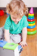 The charming little boy playing