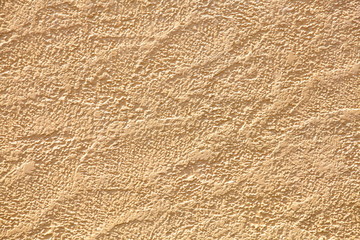 yellow concrete or stone wall and texture