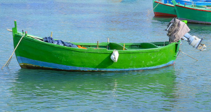 fishing rowboats called gozzo port of Polignano, Apulia Italy