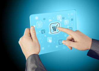 Businessman pushing shopping cart