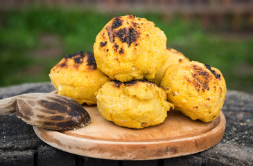 Bulz, romanian grilled polenta with cheese