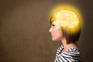 Young girl thinking with glowing brain illustration