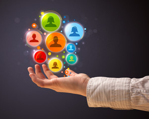 Social network icons in the hand of a woman