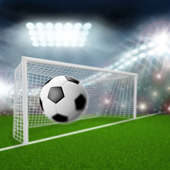 Fototapeta premium soccer ball flies into the goal