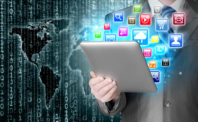 Business man use tablet pc with colorful application icons