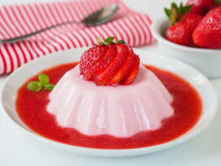 Strawberry panna cotta in strawberry honey sauce