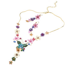 floral necklace and ear rings isolated on white