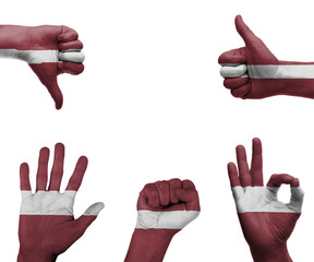 Hand set with the flag of Latvia