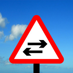 Two-way traffic crosses one-way road