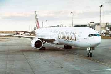 Boeing 777-300 Emirates on the airport, Prague - 65978894