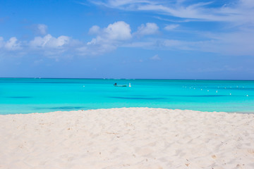 Fototapeta na wymiar Perfect white beach with turquoise water at ideal island