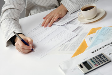 Business woman working with tax documents