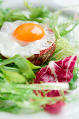 Beef tartar with fried egg