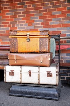 Old luggage on platform scales © Arena Photo UK