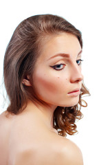 Portrait of a beautiful young woman with evening make-up