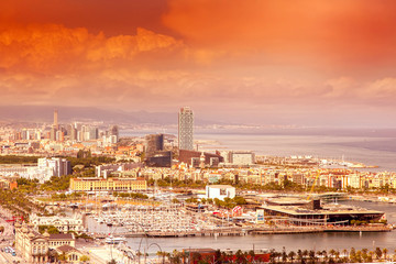 view of Barcelona from above at sunset in summer