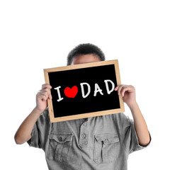 Asian boy holding with love Dad message on black board, Father's