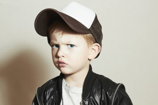 little boy.fashion children.Boy in Tracker Hat.Sad Child