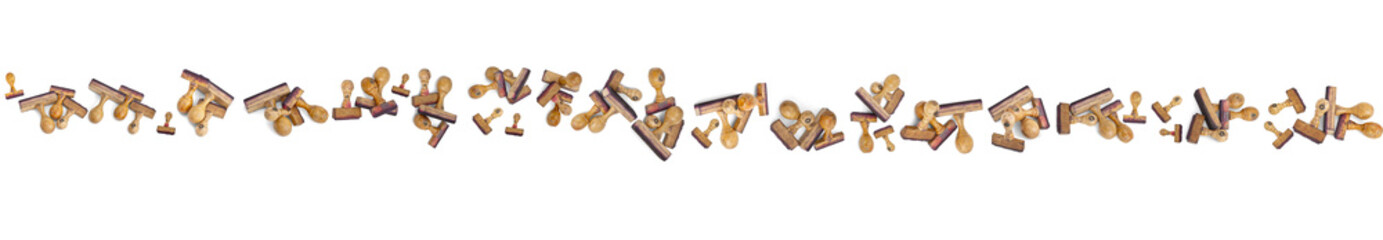 Horizontal long row wtih lots of wooden stamps
