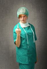 surgeon showing rude gesture