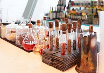 Spices and bitters on bar counter