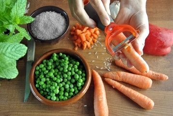 hand cutting vegetables for cooking