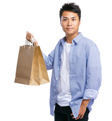 Asian man carry paper bag