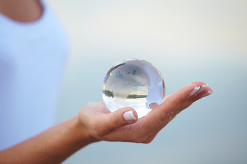 Crystal ball on hand