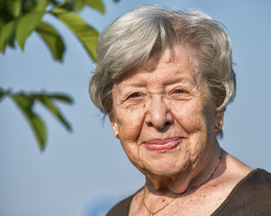 Portrait of Senior Woman Outdoors in the Summer