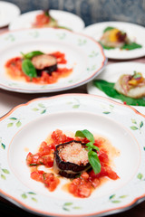 Eggplant with cheese and tomato