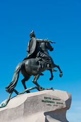 Fototapeta na wymiar Peter I monument against blue sky. Saint-petersburg, Russia