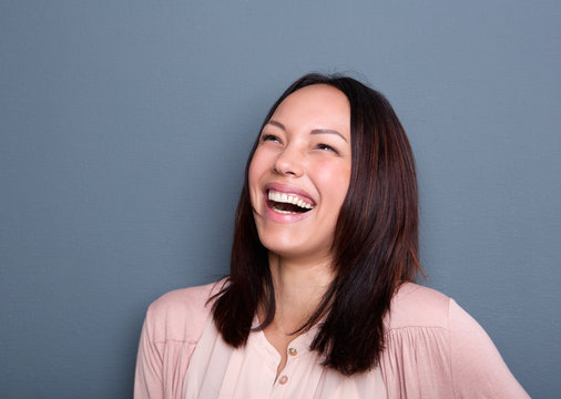 Portrait Of A Young Woman Laughing