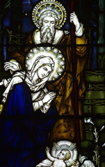 Jesus, Mary and Joseph in stained glass