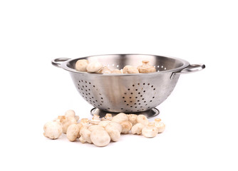 Mushrooms with colander.