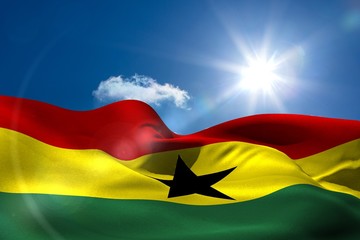 Ghana national flag under sunny sky