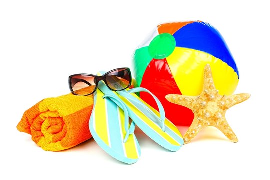 Group Of Colorful Beach Items Over White