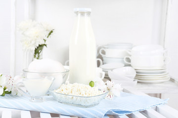 Still life with tasty dairy products on table