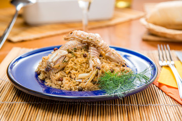 Porzione di risotto con cicale
