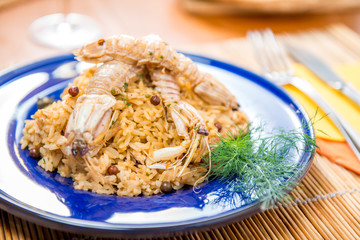 Porzione di risotto con cicale