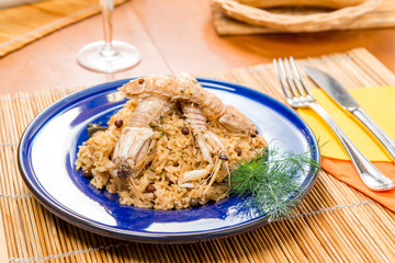 Porzione di risotto con cicale