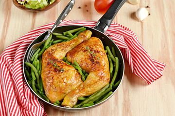 Roasted chicken legs with green beans