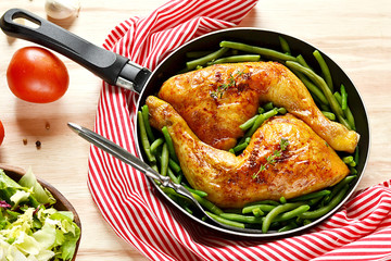 Roasted chicken legs with green beans