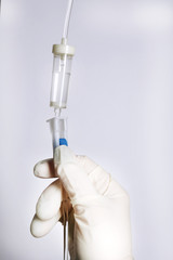 Disposable infusion set on grey background