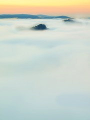 spring blue pink misty sunrise in a beautiful valley of park