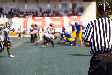 referee watching team play